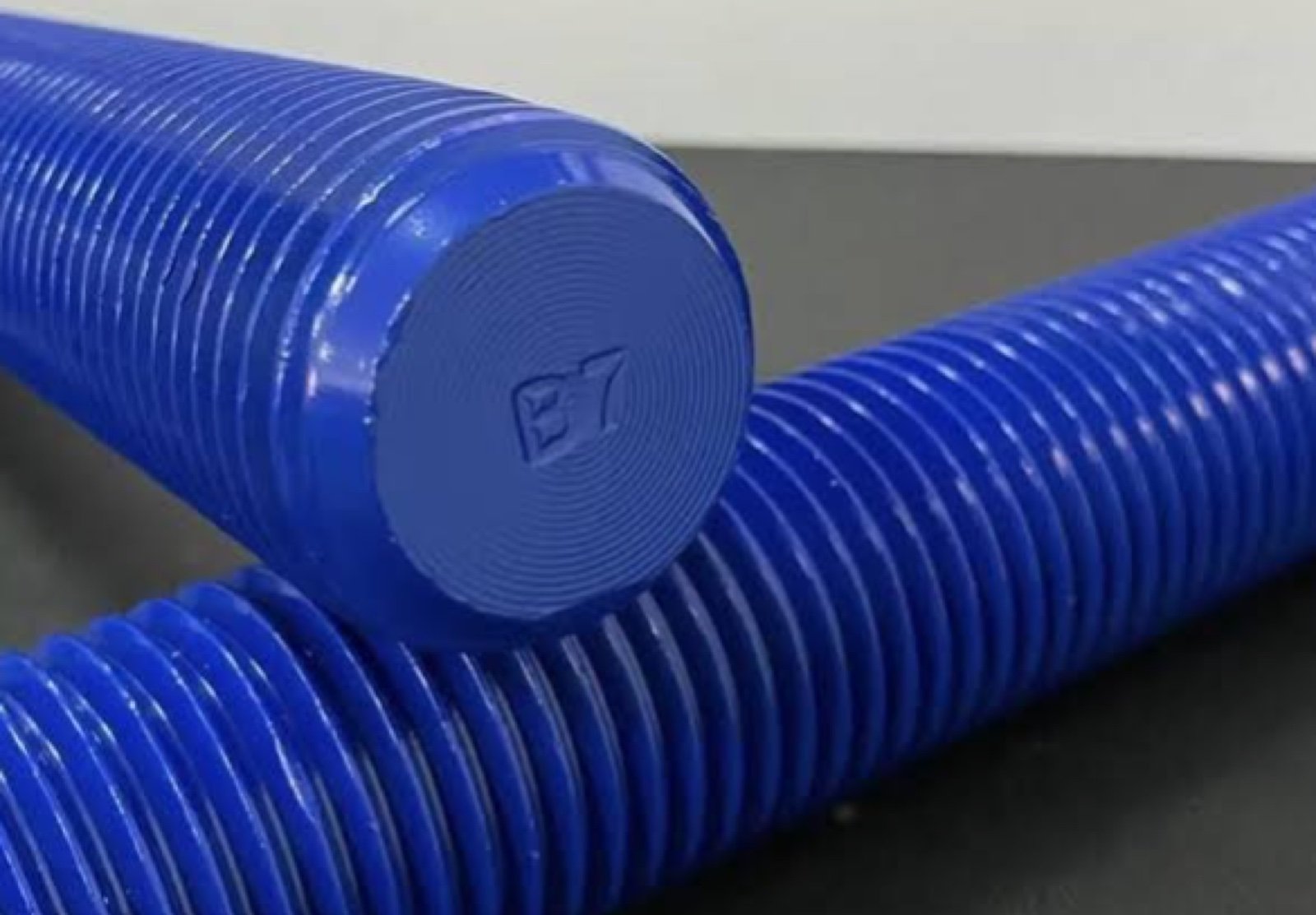 PTEF coated stud close-up showing high-performance ptfe coating | Gloscope Trading
